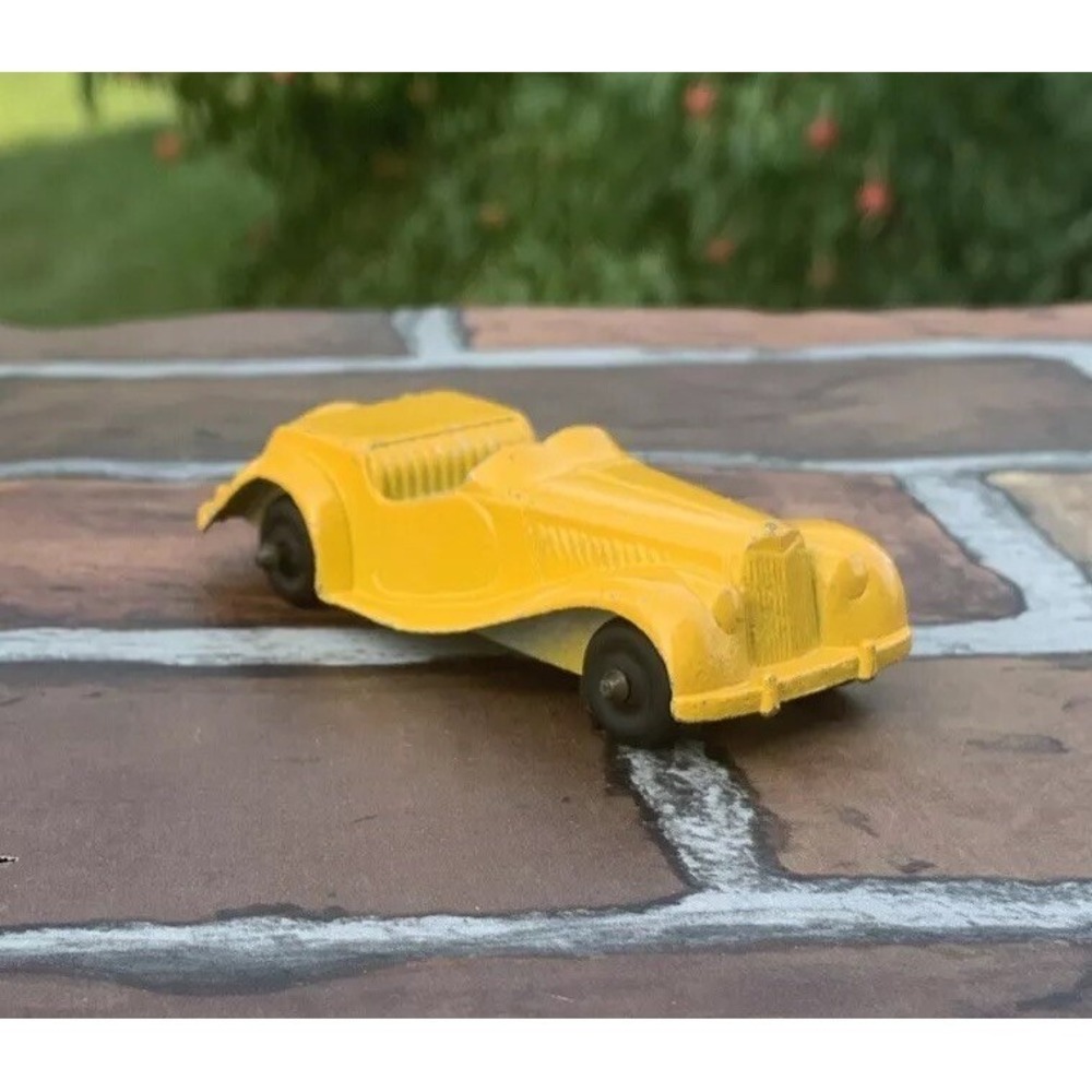 3" Tootsie Toy - 1954 MG TF Roadster - Chicago USA - Mustard Yellow- VG
